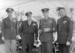 A meeting, less than a month before the Normandy landings, of (from left to right) Brigadier General Richard C. Sanders, CG of the 100th Fighter Wing; Major General Ralph Royce, then Deputy Chief of Staff for the Ninth Air Force; Marshal of the Royal Air Force Lord Trenchard; Brigadier General Otto P. Weyland, CG of the XIX TAC.