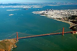 San Francisco Bay and the Golden Gate Bridge, looking southeast towards the City and East Bay. Alcatraz is the small islet in the upper-middle left.