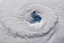 The eye and surrounding clouds of Hurricane Florence seen from the International Space Station