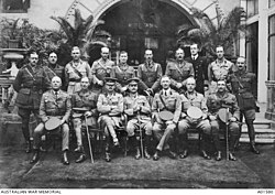 Group portrait of officers of the Australian and New Zealand Army Corps outside Shepheard's Hotel, Cairo, Egypt, March 1915. Sat in the front row in the centre is the corps commander, Lieutenant General Birdwood.