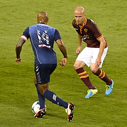 Henry attacking for the MLS All Stars in 2013