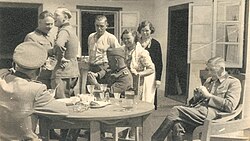 SS officers dining in the camp