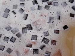 Oak chips in fermenting Chardonnay