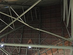 An undetonated WWII bomb deformed the steel construction over the choir.