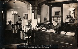 Reception of the main YMCA office on Locust St in Philadelphia, early 20th century