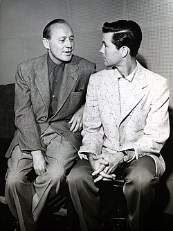 Carson as a guest on Jack Benny's television program, 1955