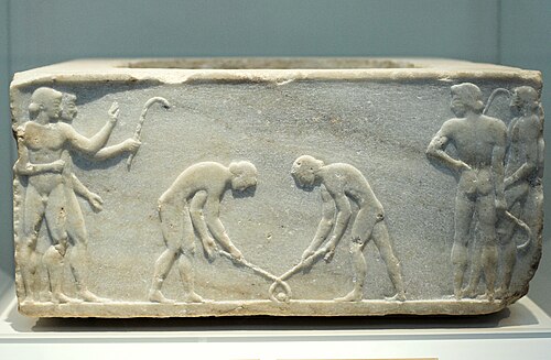 Relief of c. 510 BC depicting ancient Greek players of kerētízein, an ancestral form of hockey or ground billiards; in the National Archaeological Museum, Athens