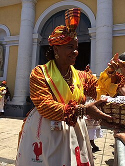 A woman wearing a traditional Guadeloupean dress