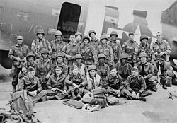 U.S. Army Pathfinders and USAAF flight crew prior to D-Day, June 1944, in front of a C-47 Skytrain at RAF North Witham