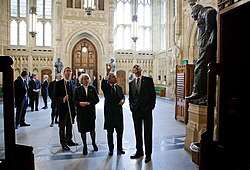 US President Barack Obama (right) in the Members' Lobby during a tour of the Palace in May 2011. With him are, from the left: the Lord Great Chamberlain, the Marquess of Cholmondeley, holding his white staff of office; the Lord Speaker, Baroness Hayman; and the Speaker of the House of Commons, John Bercow.