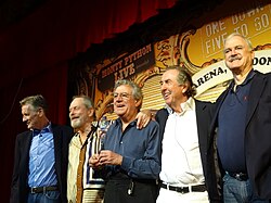 Cleese (right) with the rest of Monty Python on stage at the O2 Arena, London, in July 2014