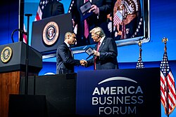 Suarez presenting President Trump with a key to the city in November 2025