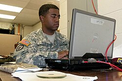 Jabbar serving as the information technology team chief for the 82nd Airborne Division's 1st Brigade Combat Team during his Army service, pictured in 2013 at Fort Polk.[47]