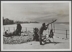 German machine gunner firing at Allied planes in front of the Kursaal in June 1940