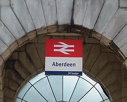 Signage at Aberdeen station in 2012, showing National Rail Double Arrow logo