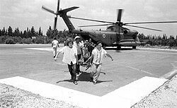 A wounded Israeli soldier arrives at Rambam Medical Center in Haifa after being evacuated by helicopter