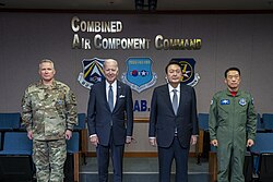 President Joe Biden greets President Yoon Suk Yeol, U.S. Army Commander Gen. Paul LaCamera and Lieutenant General Sung Chun Choi at the Air Operations Center of Osan Air Base in Seoul, South Korea on 22 May 2022