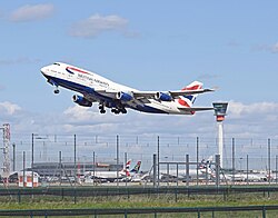 A British Airways Boeing 747-400 departs London Heathrow International Airport. This is an example of a commercial aviation service.