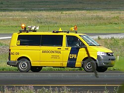 A bird control vehicle belonging to Copenhagen Airport Kastrup, equipped with various tools