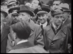 Leonese anarchist Buenaventura Durruti was fatally shot after he arrived in Madrid to reinforce the morale of the Republicans during an unsuccessful Francoist siege in Madrid.[267] His funeral, headed (in the image) by Lluís Companys, president of the Generalitat of Catalonia, and Joan García i Oliver, Minister of Justice of the Spanish Republic, was in Barcelona.[268]