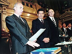 Fernando de la Rúa takes the oath of office next to his vice-president Carlos Álvarez.