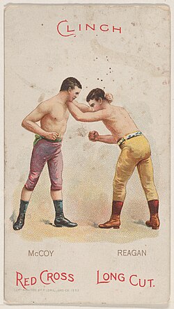 Boxer (left) using collar tie against boxer (right) using cross collar tie