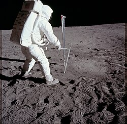 Buzz Aldrin taking a core sample of the Moon during the Apollo 11 mission
