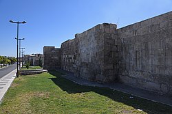 Some stretches of the old city walls remain standing