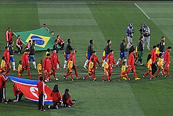 The Brazilian and North Korean teams before their group stage match