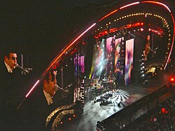 Elton John on piano at the Concert for Diana at Wembley on 1 July 2007, commemorating Diana, Princess of Wales