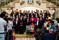Modrić alongside Real Madrid presenting their 2022 Champions League trophy to the Virgin of Almudena.