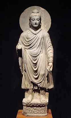 Standing Buddha from Gandhara (1st–2nd century CE)[38]