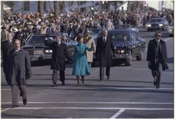 President Jimmy Carter and Rosalynn Carter walk down Pennsylvania Avenue during the inauguration.