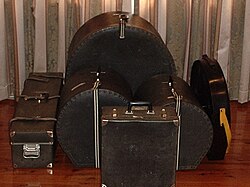 From left: traps case, floor tom case, snare case (front), twin hanging toms case, cymbal case, bass drum case (rear).