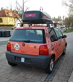 Car with maximum speed reduced to 25 km/h (16 mph), hence using an insurance plate[z]