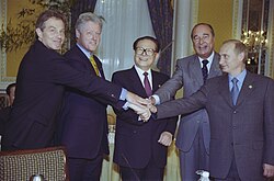 British Prime Minister Tony Blair, U.S. President Bill Clinton, Chinese President Jiang Zemin, French President Jacques Chirac, and Russian President Vladimir Putin at the Waldorf Astoria on September 7, 2000