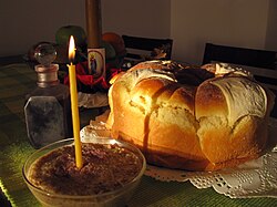 Ritual foods for Slava: Slavski kolač (yeast bread) and koljivo (boiled wheat sweetened and mixed with walnuts).