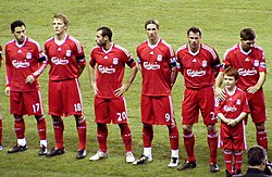 Torres (third from right) lining up for Liverpool in 2010