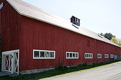 A cow barn in Enfield Shaker Village in Enfield, New Hampshire, built 1854, listed with NRHP[24]