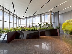 The Living Machine installation in the lobby of the Port of Portland headquarters which was completed and ready for occupation May 2010. The decentralized wastewater reuse system contributed to the headquarter's certification as a LEED Platinum building by the U.S. Green Building Council.