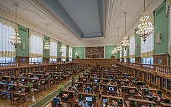 Reading room three, the largest.[12] At the far end, a monument to Lenin. Busts along the walls.