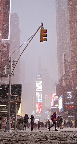 Near-whiteout conditions dim the far end of Times Square in New York City, 2015.