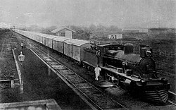 The station with a freight train stopped, c. 1909-12