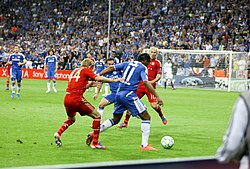 Drogba holding against Bayern Munich during the 2012 UEFA Champions League Final