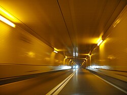 The Harbor Tunnel in Baltimore, USA, which carries I-895, serves as an example of a water-crossing tunnel built instead of a bridge.