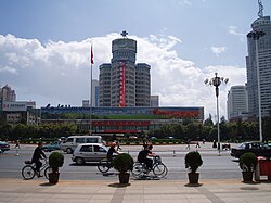 Dongfeng (East Wind) Square. The building in the background, Workers' Cultural Hall, has been demolished for subway construction.