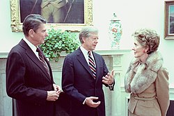 Outgoing president Jimmy Carter and President-elect Ronald Reagan with his wife Nancy in the Oval Office on November 20, 1980