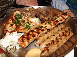 Bosnian meat platter that contains, among other things, ćevapi, which is considered the national dish of Bosnia and Herzegovina