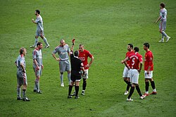Liverpool players (in grey) during the 4–1 win against Manchester United at Old Trafford on 14 March 2009.