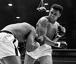 Clay whips a right to the head of Liston